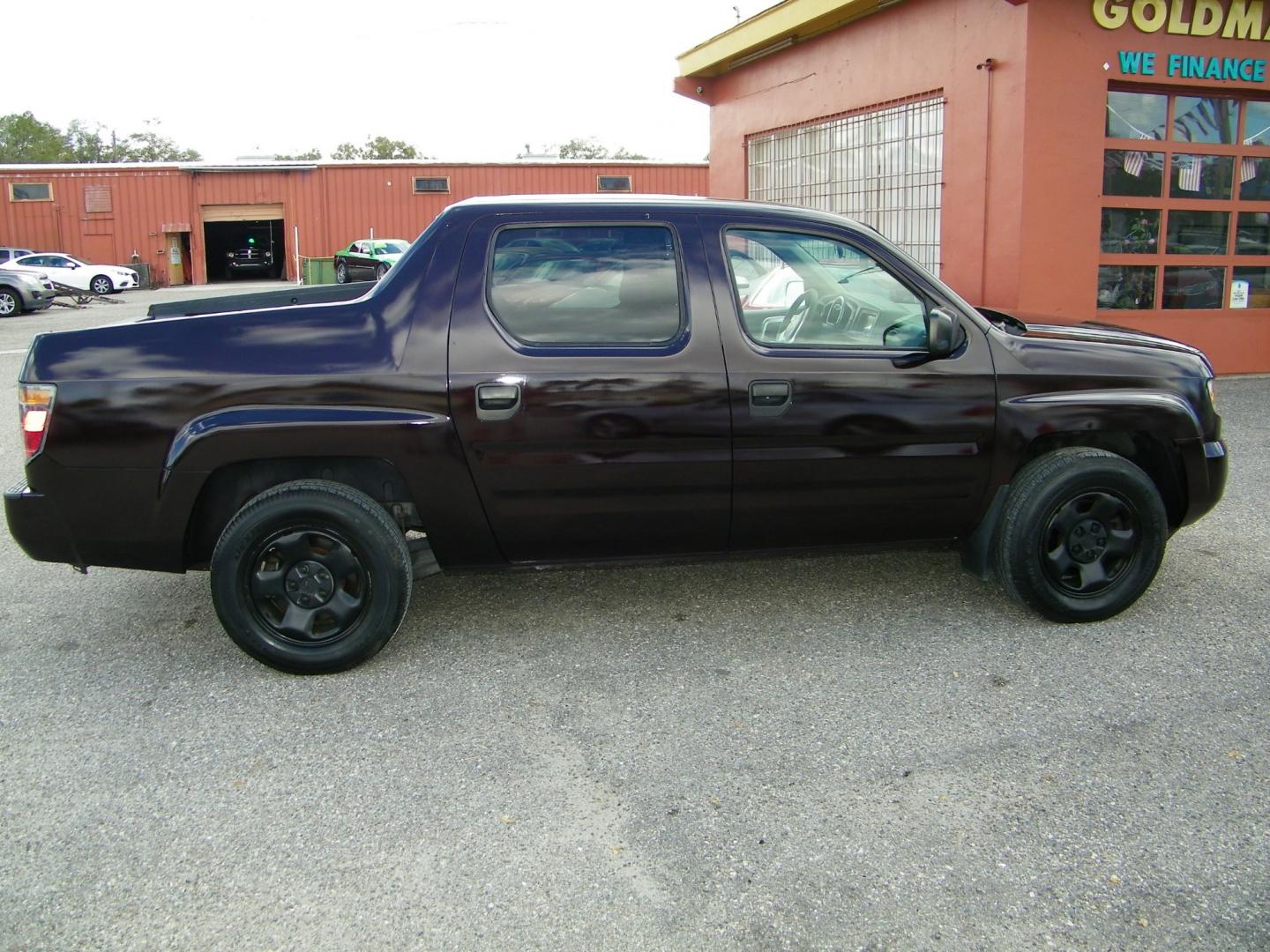 2007 Maroon /Grey Honda Ridgeline RT (2HJYK16267H) with an 3.5L V6 SOHC 24V engine, 5-Speed Automatic Overdrive transmission, located at 4000 Bee Ridge Road, Sarasota, FL, 34233, (941) 926-0300, 27.298664, -82.489151 - Photo#6